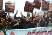 Supporters of a religious group ‘Markazi Jamiyat Ahle Hadith Pakistan’ hold a demonstration to condemn Iran strike in the Pakistani border area, in Lahore, Pakistan, Friday, Jan. 19, 2024. The unprecedented attacks by both Pakistan and Iran on either side of their border appeared to target Baluch militant groups with similar separatist goals. The countries accuse each other of providing a haven to the groups in their respective territories. (AP Photo/K.M. Chaudary)
