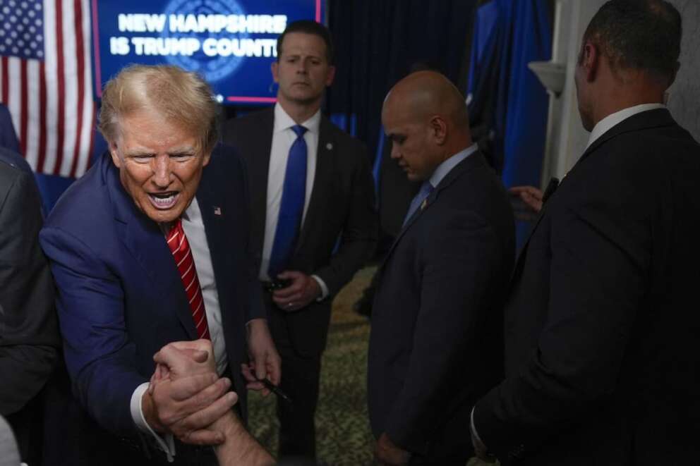 Republican presidential candidate former President Donald Trump greets supporters at a campaign event in Laconia, N.H., Monday, Jan. 22, 2024. (AP Photo/Matt Rourke) Associated Press/LaPresse Only Italy and Spain