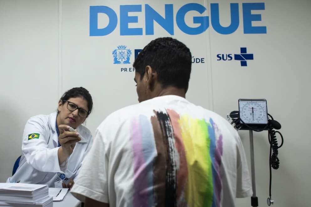 A nurse takes a patient’s temperature as she screens for dengue at the Rodolpho Rocco Municipal Polyclinic in Rio de Janeiro, Brazil, Wednesday, Feb. 7, 2024. (AP Photo/Bruna Prado)