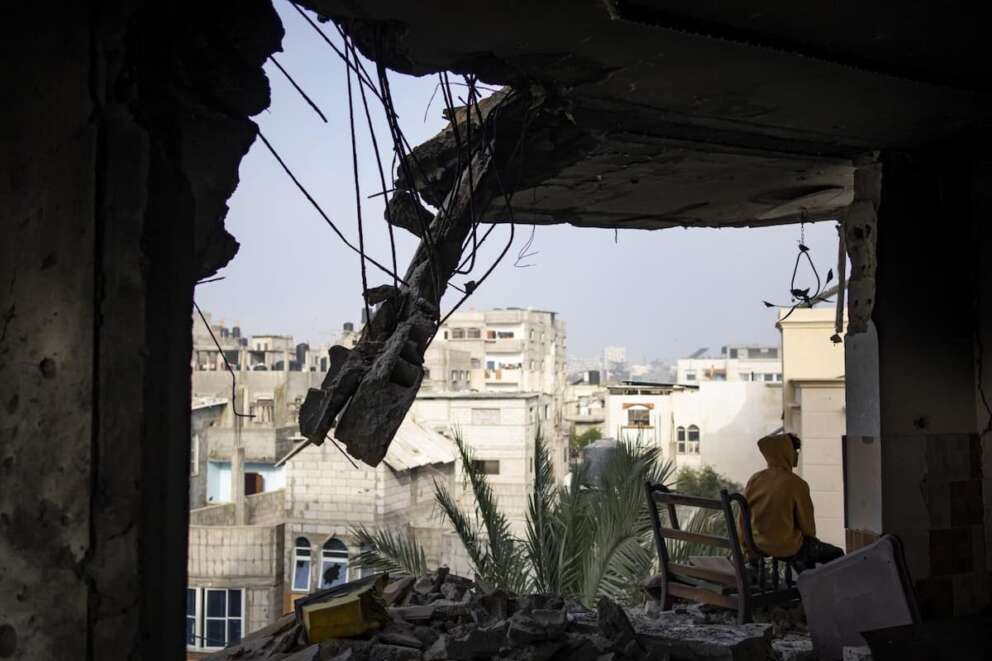 A Palestinian sits in his house destroyed in an Israeli strike in Rafah, Gaza Strip, Saturday, Feb.10, 2024. (AP Photo/Fatima Shbair) Associated Press / LaPresse Only italy and Spain