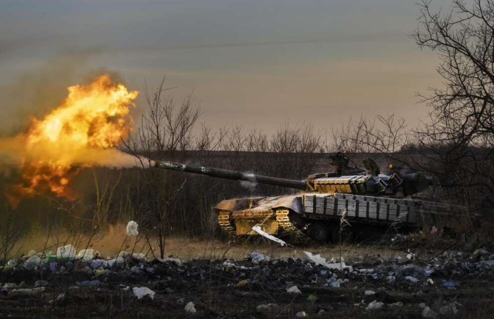 A Ukrainian tank of the 17th Tank Brigade fires at Russian positions in Chasiv Yar, the site of fierce battles with the Russian troops in the Donetsk region, Ukraine, Thursday, Feb. 29, 2024. (AP Photo/Efrem Lukatsky)