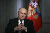 Russian President Vladimir Putin gestures while speaking during an interview with Rossiya Segodnya International Media Group Director General Dmitry Kiselev, back to a camera, in Moscow, Russia, Tuesday, March 12, 2024. (Gavriil Grigorov, Sputnik, Kremlin Pool Photo via AP) Associated Press/LaPresse Only Italy and Spain