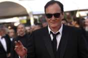 Quentin Tarantino poses for photographers upon arrival at the awards ceremony during the 76th international film festival, Cannes, southern France, Saturday, May 27, 2023. (Photo by Joel C Ryan/Invision/AP)