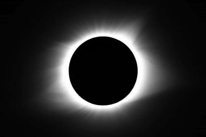 FILE – The moon covers the sun during a total solar eclipse Monday, Aug. 21, 2017, in Cerulean, Ky. On April 8, 2024, the sun will pull another disappearing act across parts of Mexico, the United States and Canada, turning day into night for as much as 4 minutes, 28 seconds. (AP Photo/Timothy D. Easley, File)