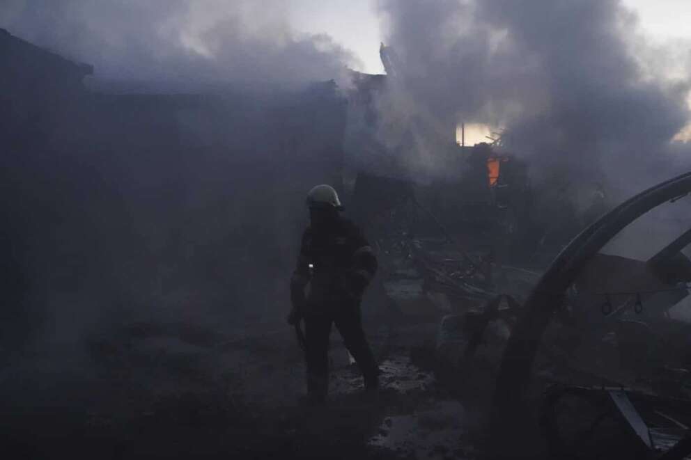 Firefighters try to put out the fire after a hit by Russian shelling in Kharkiv, Ukraine, Saturday, May 4, 2024. (AP Photo/Andrii Marienko)