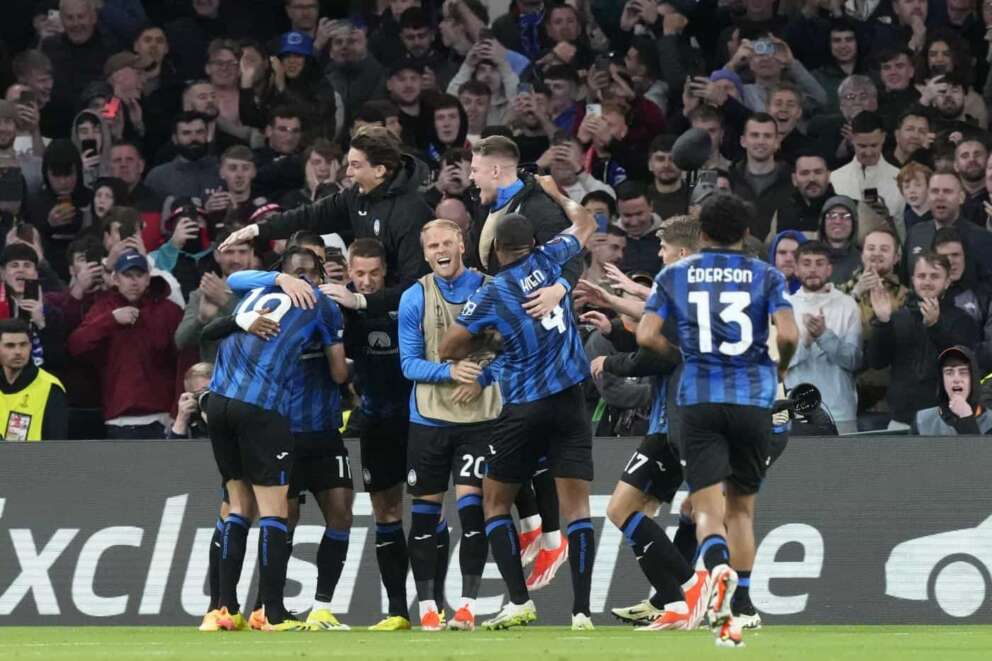 Atalanta players celebrate after their teammate Ademola Lookman scored his side’s third goal during the Europa League final soccer match between Atalanta and Bayer Leverkusen at the Aviva Stadium in Dublin, Ireland, Thursday, May 23, 2024. (AP Photo/Frank Augstein)