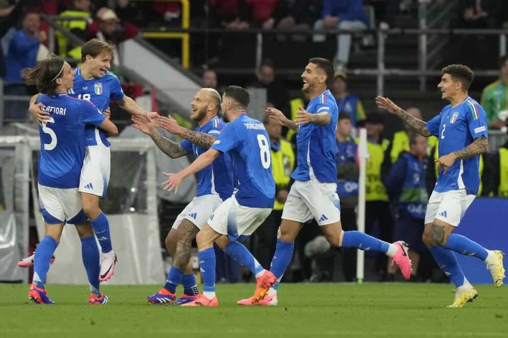 Italian players celebrate after Nicolo Barella scored his side’s second goal during a Group B match between Italy and Albania at the Euro 2024 soccer tournament in Dortmund, Germany, Saturday, June 15, 2024. (AP Photo/Frank Augstein)