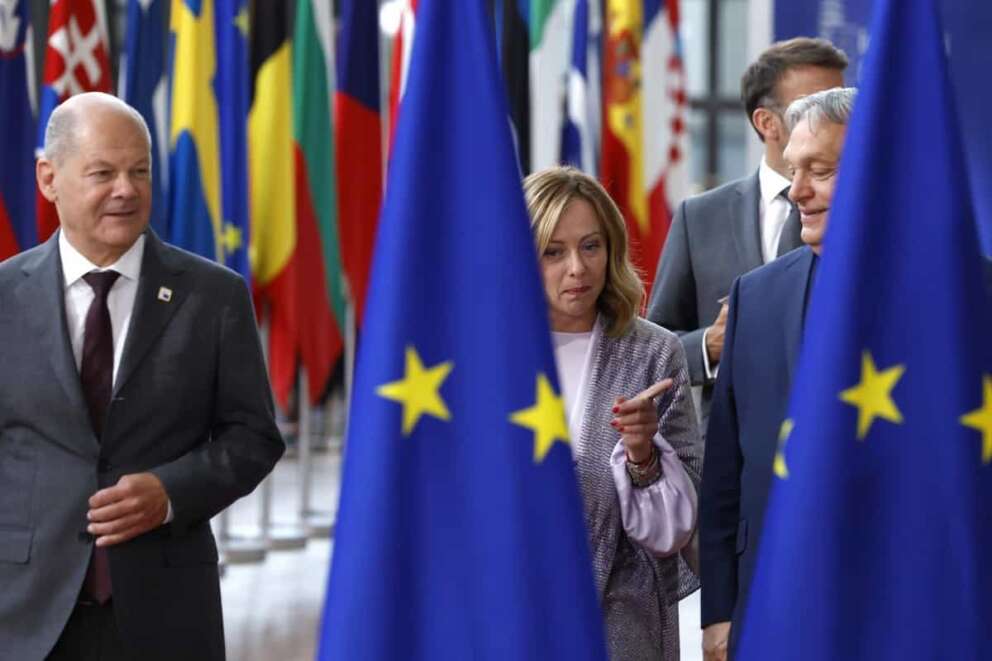 Hungary’s Prime Minister Viktor Orban, right, speaks with Italy’s Prime Minister Giorgia Meloni, center, prior to a group photo at an EU summit in Brussels, Thursday, June 27, 2024. European Union leaders are expected on Thursday to discuss the next EU top jobs, as well as the situation in the Middle East and Ukraine, security and defence and EU competitiveness. (AP Photo/Geert Vanden Wijngaert)