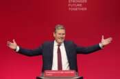FILE – Leader of the British Labour Party Keir Starmer gestures as he arrives to make his keynote speech at the annual party conference in Brighton, England, on Sept. 29, 2021. The Labour Party hopes that is just what Britain wants and needs after 14 turbulent years of Conservative rule. Starmer, the center-left party’s 61-year-old leader, is the current favorite to win the country’s July 4 election. (AP Photo/Alastair Grant, File)