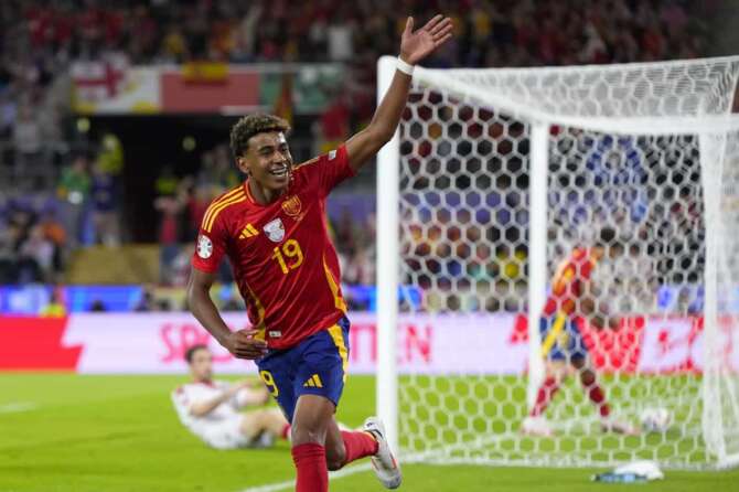 Spain’s Lamine Yamal ceelbrates a goal that was disallowed fro an offside during a round of sixteen match between Spain and Georgia at the Euro 2024 soccer tournament in Cologne, Germany, Sunday, June 30, 2024. (AP Photo/Manu Fernandez)