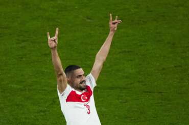 Turkey’s Merih Demiral celebrates after scoring his side second goal during a round of sixteen match between Austria and Turkey at the Euro 2024 soccer tournament in Leipzig, Germany, Tuesday, July 2, 2024. UEFA has launched an investigation into Turkey soccer player Merih Demiral’s “alleged inappropriate behavior” after he celebrated a goal at Euro 2024 by displaying a hand sign associated with an ultra-nationalist group. (AP Photo/Ebrahim Noroozi) Associated Press/LaPresse