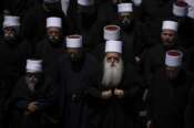 Druze clergymen attend the funeral of some of the 12 children and teens killed in a rocket strike at a soccer field at the village of Majdal Shams,in the Israeli-annexed Golan Heights, Sunday, July 28, 2024. It’s the deadliest strike on an Israeli target along the country’s northern border since the fighting between Israel and the Lebanese militant group Hezbollah began. (AP Photo/Leo Correa) Associated Press / LaPresse Only italy and Spain