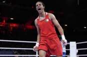 Algeria’s Imane Khelif celebrates after defeating Hungary’s Anna Hamori in their women’s 66kg quarterfinal boxing match at the 2024 Summer Olympics, Saturday, Aug. 3, 2024, in Paris, France. (AP Photo/John Locher) Associated Press/LaPresse Associated Press/LaPresse