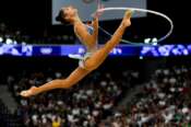 Sofia Raffaeli, of Italy, performs her hoop exercise in THE rhythmic gymnastics individuals all-round qualification round at La Chapelle Arena at the 2024 Summer Olympics, Thursday, Aug. 8, 2024, in Paris, France. (AP Photo/Francisco Seco) Associated Press / LaPresse Only italy and Spain