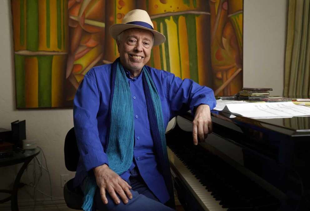 Brazilian musician Sergio Mendes poses for a portrait at home, Tuesday, May 18, 2021, in Los Angeles. The documentary “Sergio Mendes & Friends: A Celebration” will be airing on PBS in June. (AP Photo/Chris Pizzello)