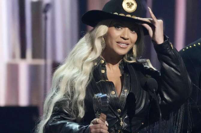 FILE – Beyonce, left, accepts the Innovator Award during the iHeartRadio Music Awards, April 1, 2024, at the Dolby Theatre in Los Angeles. (AP Photo/Chris Pizzello, file)