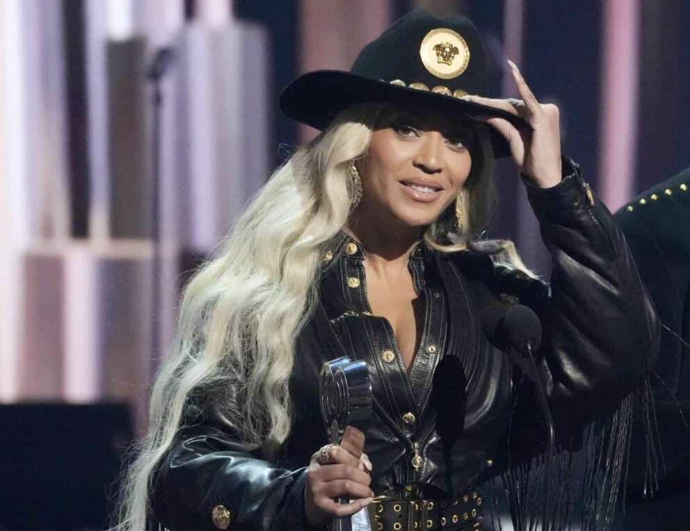 FILE – Beyonce, left, accepts the Innovator Award during the iHeartRadio Music Awards, April 1, 2024, at the Dolby Theatre in Los Angeles. (AP Photo/Chris Pizzello, file)