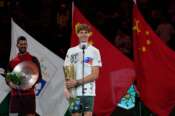 Jannik Sinner of Italy speaks with his trophy after defeating Novak Djokovic of Serbia in the men’s singles finals match for the Shanghai Masters tennis tournament at Qizhong Forest Sports City Tennis Center in Shanghai, China, Sunday, Oct. 13, 2024. (AP Photo/Andy Wong)