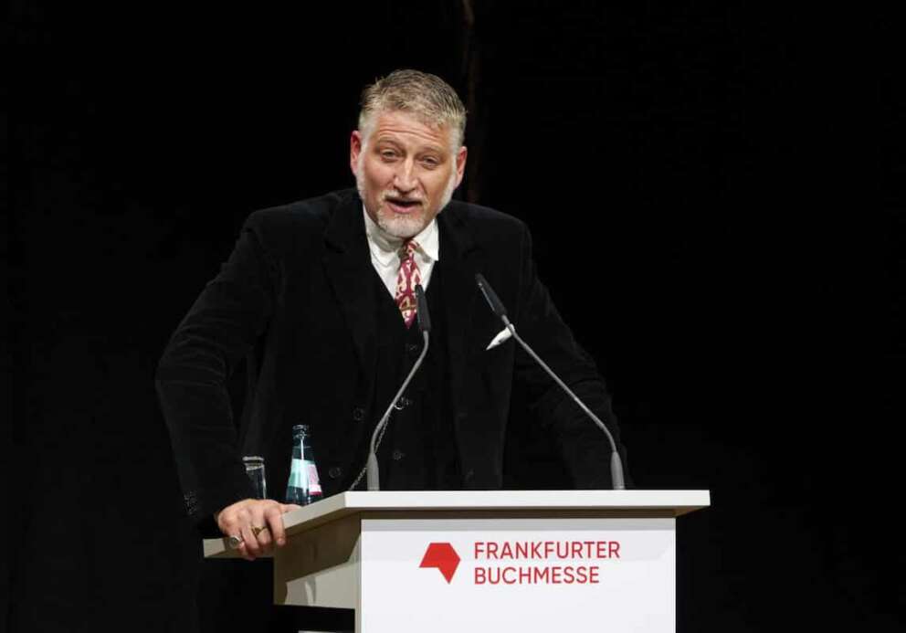 Italian Minister of Culture, Alessandro Giuli, delivers a speech during the opening ceremony of the Frankfurter Buchmesse (Book Fair) in Frankfurt, Germany, Tuesday, Oct. 15, 2024. (Andreas Arnold/dpa via AP)