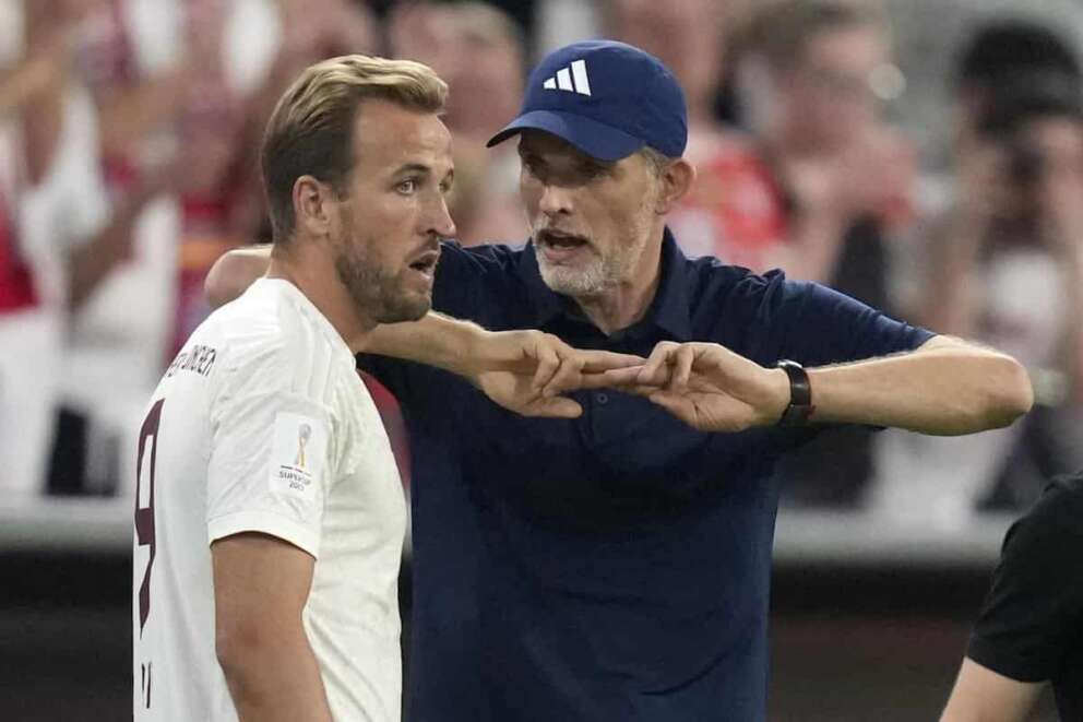 FILE – Then Bayern’s head coach Thomas Tuchel talks to Bayern’s Harry Kane during the German Super Cup final between FC Bayern Munich and RB Leipzig at the Allianz Arena stadium in Munich, Germany, Saturday, Aug. 12, 2023. (AP Photo/Matthias Schrader, File)