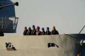 Security official stands on the Italian navy ship Libra as it arrives at the port of Shengjin, northwestern Albania Wednesday, Oct. 16, 2024, carrying the first group of migrants who were intercepted in international waters. (AP Photo/Vlasov Sulaj) associated Press / LaPresse Only italy and Spain