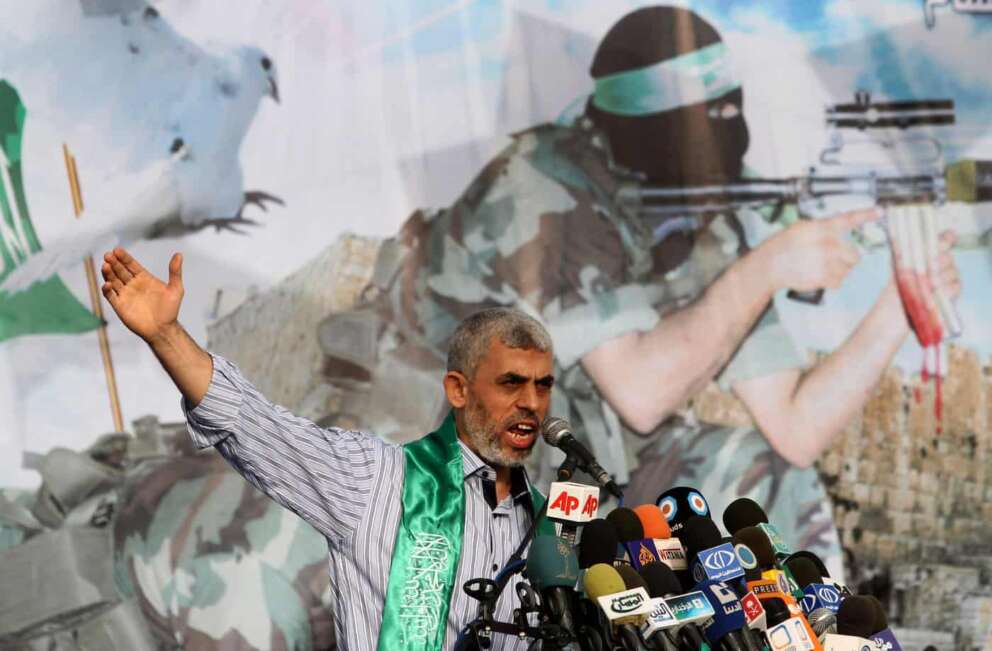 FILE – Yahya Sinwar talks during a rally in Khan Younis, southern Gaza Strip, on Oct. 21, 2011. (AP Photo/Hatem Moussa, File)