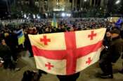 A protester holds Georgian flag during an opposition protest against the results of the parliamentary election in Tbilisi, Georgia, Monday, Oct. 28, 2024. (AP Photo/Shakh Aivazov) Associated Press / LaPresse Only italy and Spain