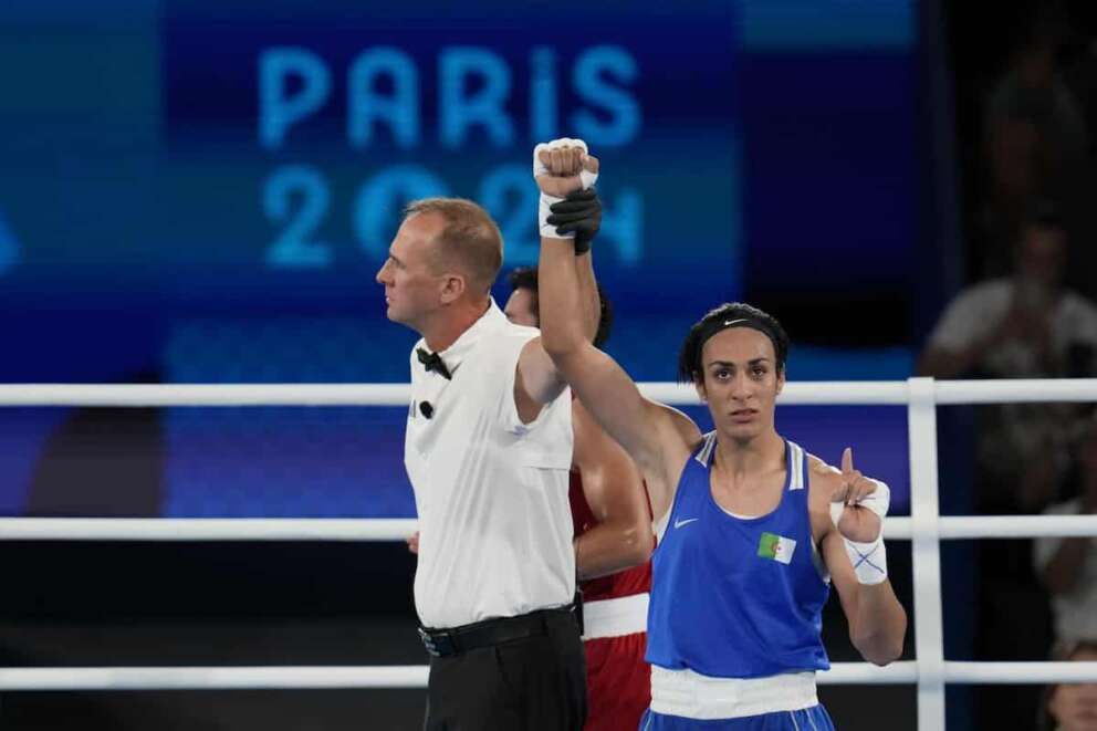 Algeria’s Imane Khelif reacts after defeating Thailand’s Janjaem Suwannapheng in their women’s 66 kg semifinal boxing match at the 2024 Summer Olympics, Tuesday, Aug. 6, 2024, in Paris, France. (AP Photo/Ariana Cubillos)