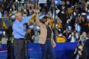 Former President Barack Obama gestures to Democratic presidential nominee Vice President Kamala Harris after introducing her to speak during a campaign rally for Harris on Thursday, Oct. 24, 2024, in Clarkston, Ga. (AP Photo/Mike Stewart)