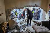 Rescuers and residents search for victims at the site of an Israeli airstrike that targeted a building in Beirut, Lebanon, Tuesday, Nov. 26, 2024. (AP Photo/Hassan Ammar) Associated Press / LaPresse Only italy and Spain