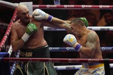 Britain’s Tyson Fury, left, and Ukraine’s Oleksandr Usyk trade blows during their undisputed heavyweight world championship boxing fight at the Kingdom Arena in Riyadh, Saudi Arabia, Sunday, May 19, 2024. (AP Photo/Francisco Seco)