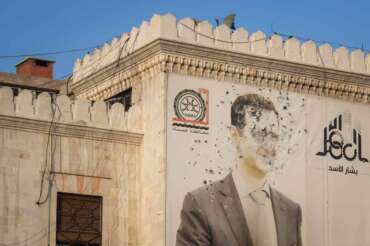 An image of Syrian President Bashar Assad, riddled with bullets, is seen on the facade of the provincial government office in the aftermath of the opposition’s takeover of Hama, Syria, Friday, Dec. 6, 2024. (AP Photo/Omar Albam) associated Press / LaPresse Only italy and Spain