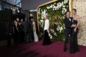 Tilda Swinton, from left, Ewan McGregor, and Mary Elizabeth Winstead arrive at the 82nd Golden Globes on Sunday, Jan. 5, 2025, at the Beverly Hilton in Beverly Hills, Calif. (Photo by Jordan Strauss/Invision/AP) Associated Press/LaPresse