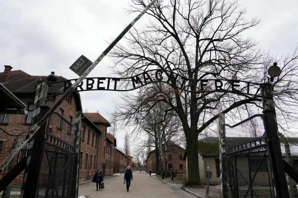 People visit the Memorial and Museum Auschwitz-Birkenau, a former Nazi German concentration and extermination camp, in Oswiecim, Poland, Sunday, Jan. 26, 2025. (AP Photo/Czarek Sokolowski)